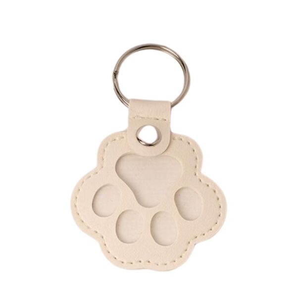 <strong>Guau!</strong> Llavero Guardapelos en Forma de Patita, Color Blanco